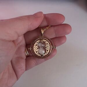 Elegant Gold Hourglass Pendant Necklace